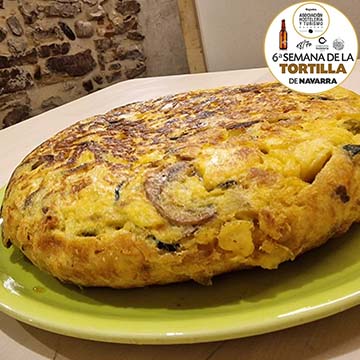 Tortilla con champiñones, queso y calabacin del Basoko Taberna