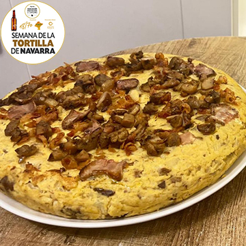 Tortilla de patata trufada con hongos, foie y papada ibérica del Bar Casa Otano de Pamplona